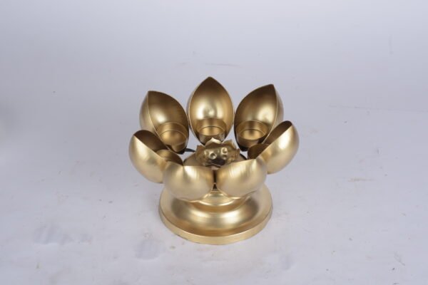 Rotating 7 diya candle holder with urli