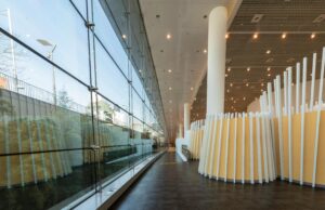 Explore a sleek and modern hallway with glass walls, located in Gwangju, South Korea.
